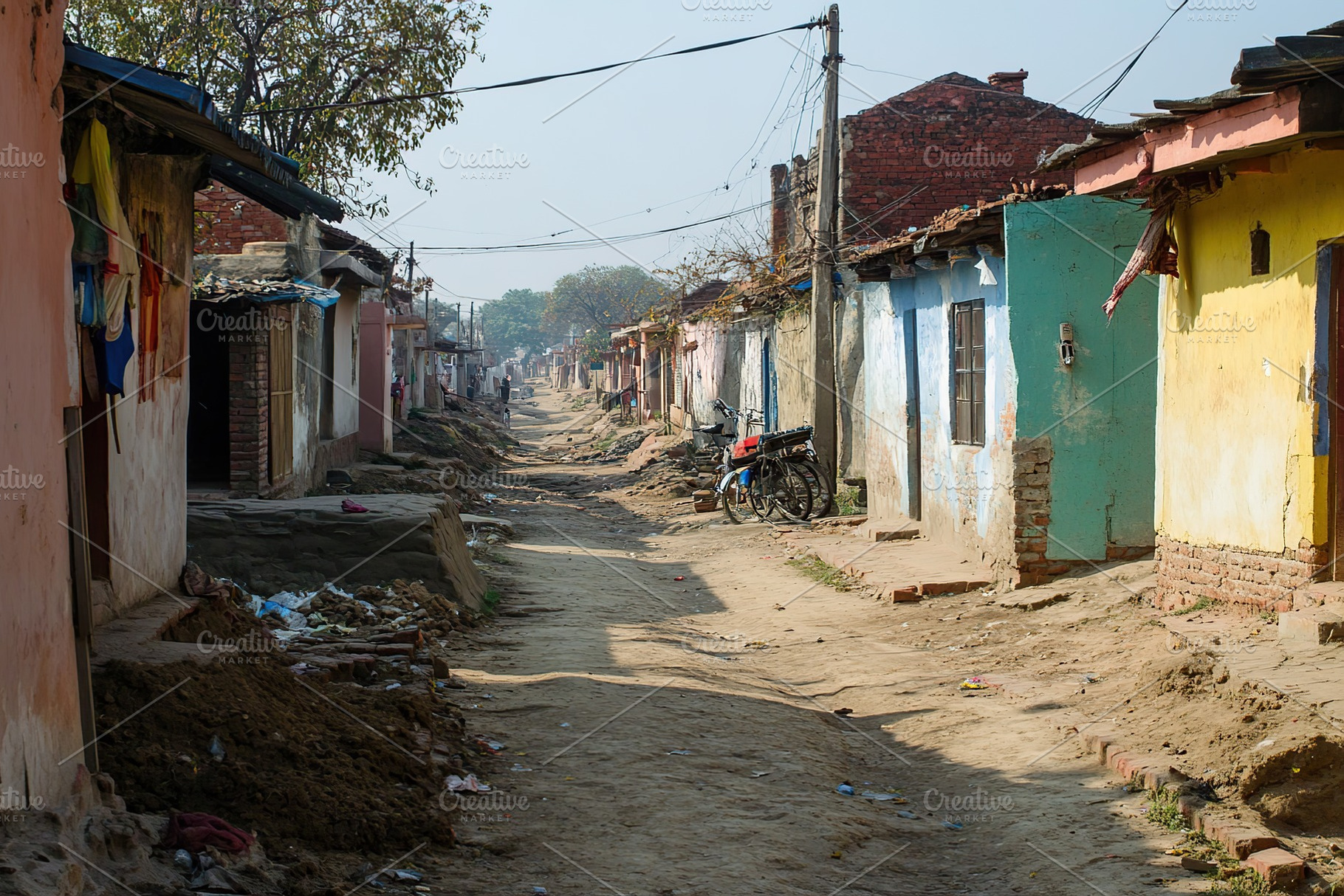 Exploring a vibrant Indian village street during a sunny daytime, an Architecture Photo by AlyaAnd