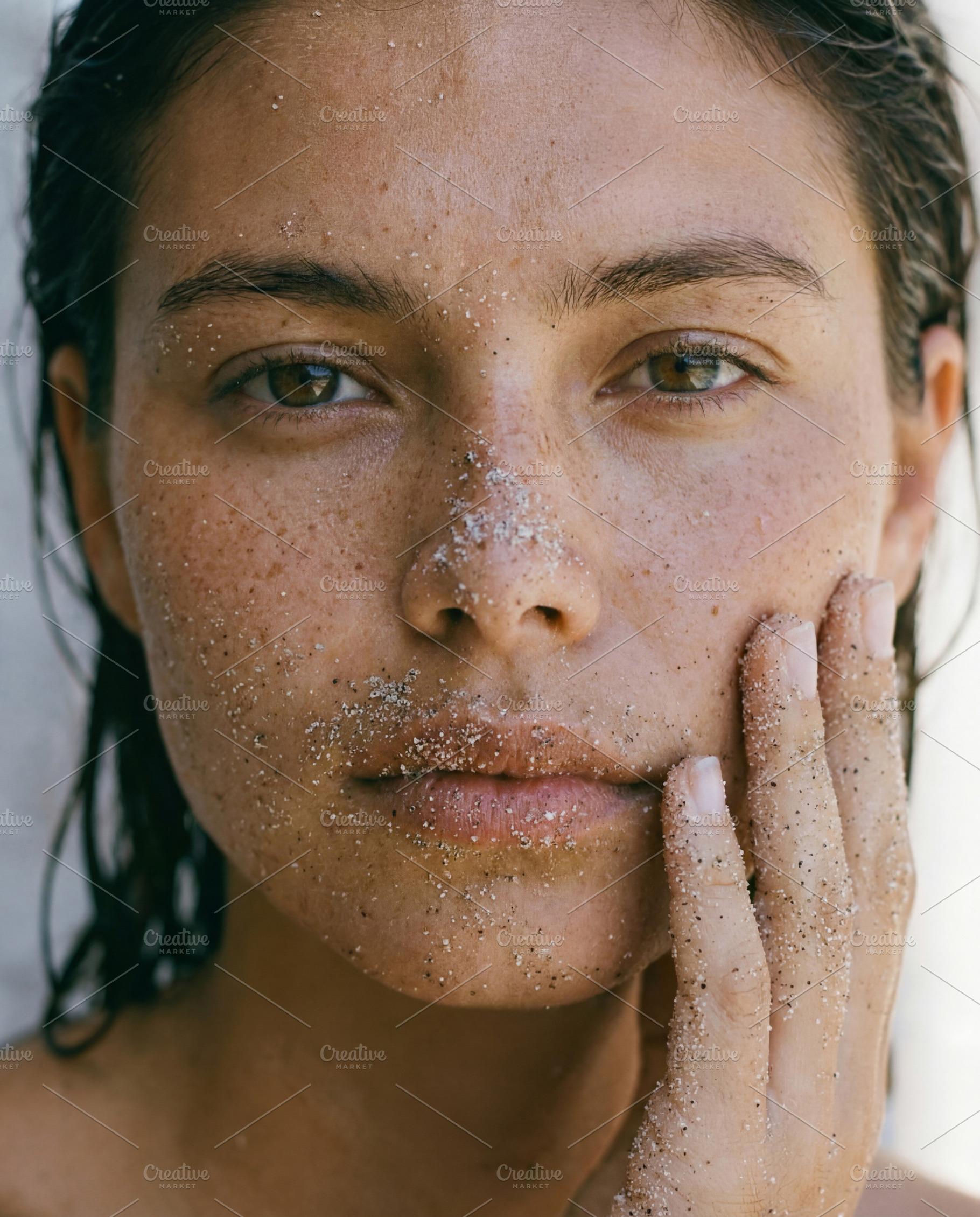 Portrait of Woman with Sand on Face, a Person Photo by Virgo Studio
