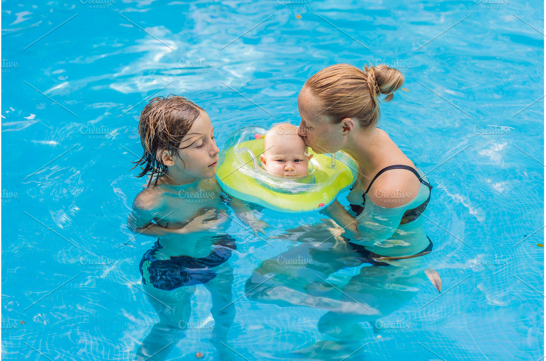 Mother with her older son and baby, a Sports & Recreation Photo by Elizaveta Galitskaya