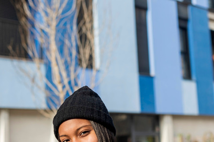 Young beautiful black woman standing