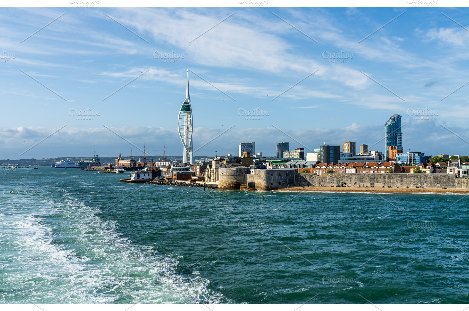 Spinnaker tower overlooks the harbor, an Architecture Photo by Backyard Stock