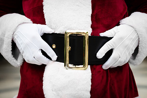 Close up of Santa Claus belt and white gloved hands, a Person Photo by etorres69