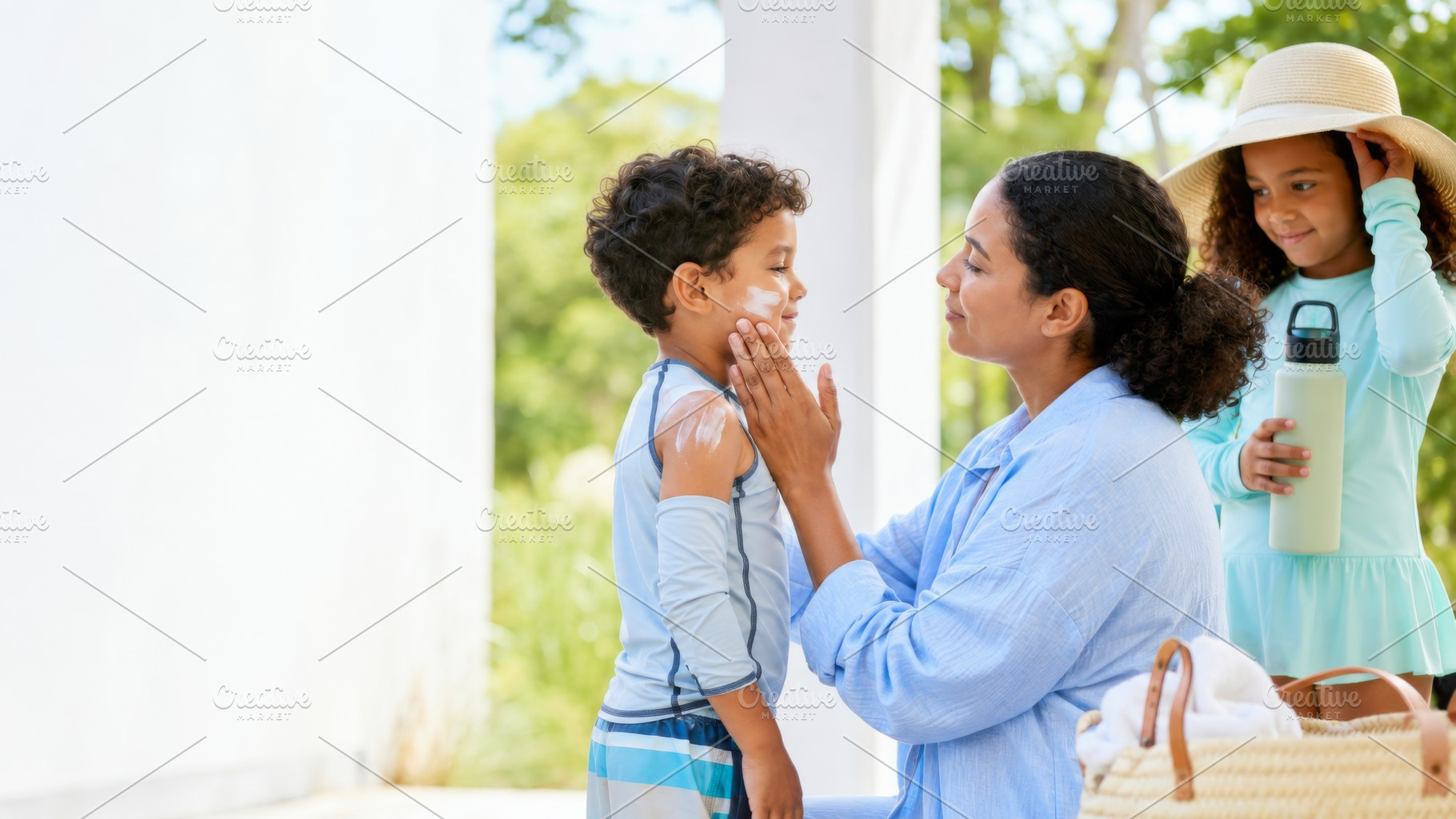 Mother applying sunscreen on child o, a Photo by Dvoevnore photos