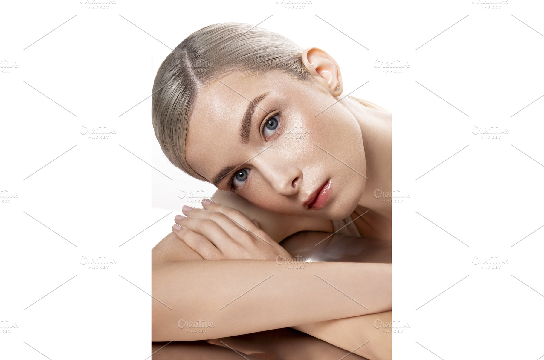 A woman is lying on a table with her, a Beauty & Fashion Photo by korabkova