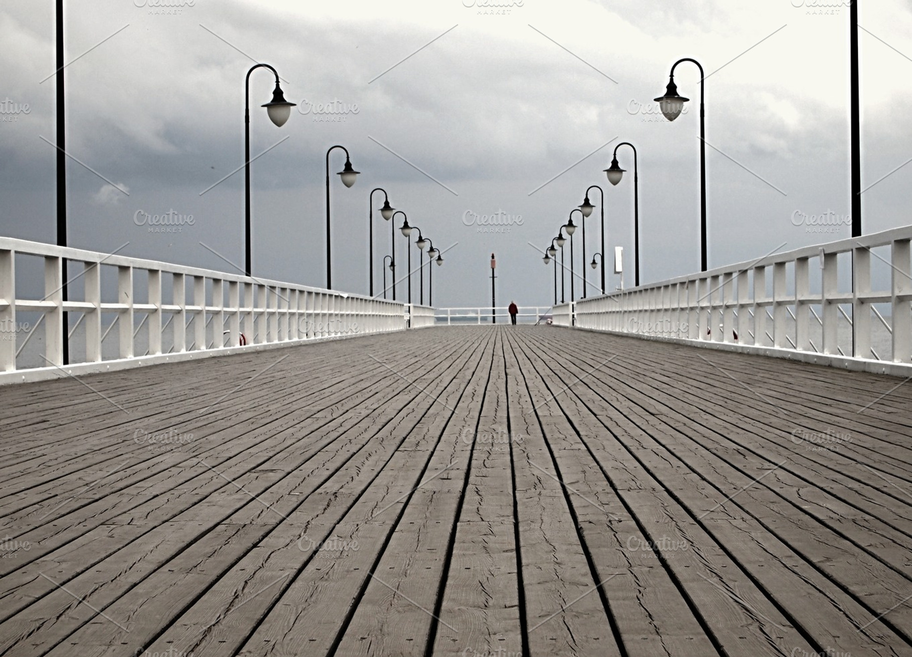 Man Standing On The Pier