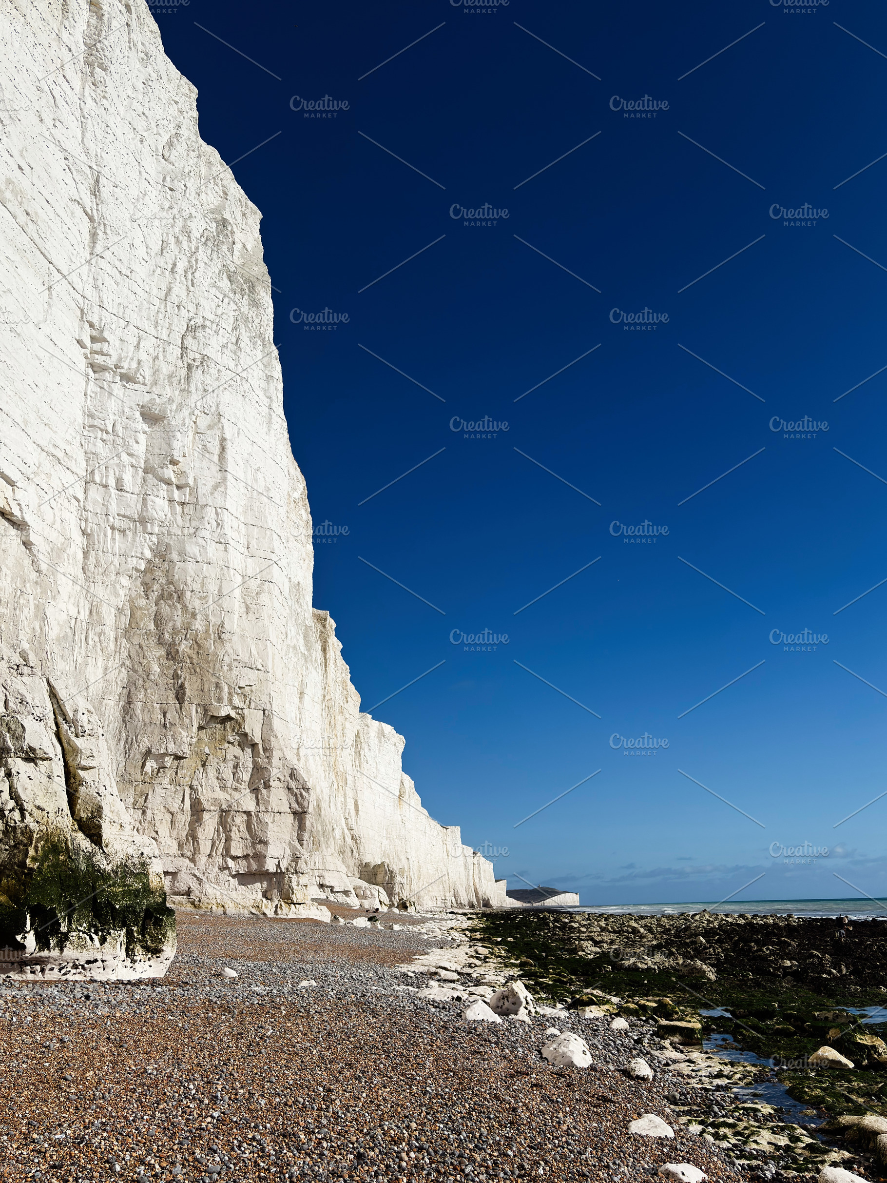 Seven Sisters Cliffs along East Sussex coast under a bright blue sky, a Nature Photo by AS photostudio