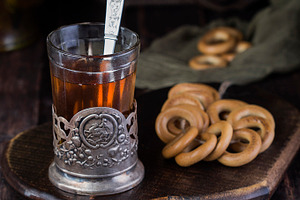 Tea in a glass with a bage stock photo containing beverage and breakfast