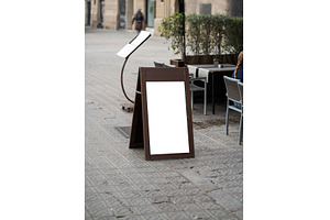 Blank sandwich board sign with white, a Nature Photo by volodymyrshtun13795