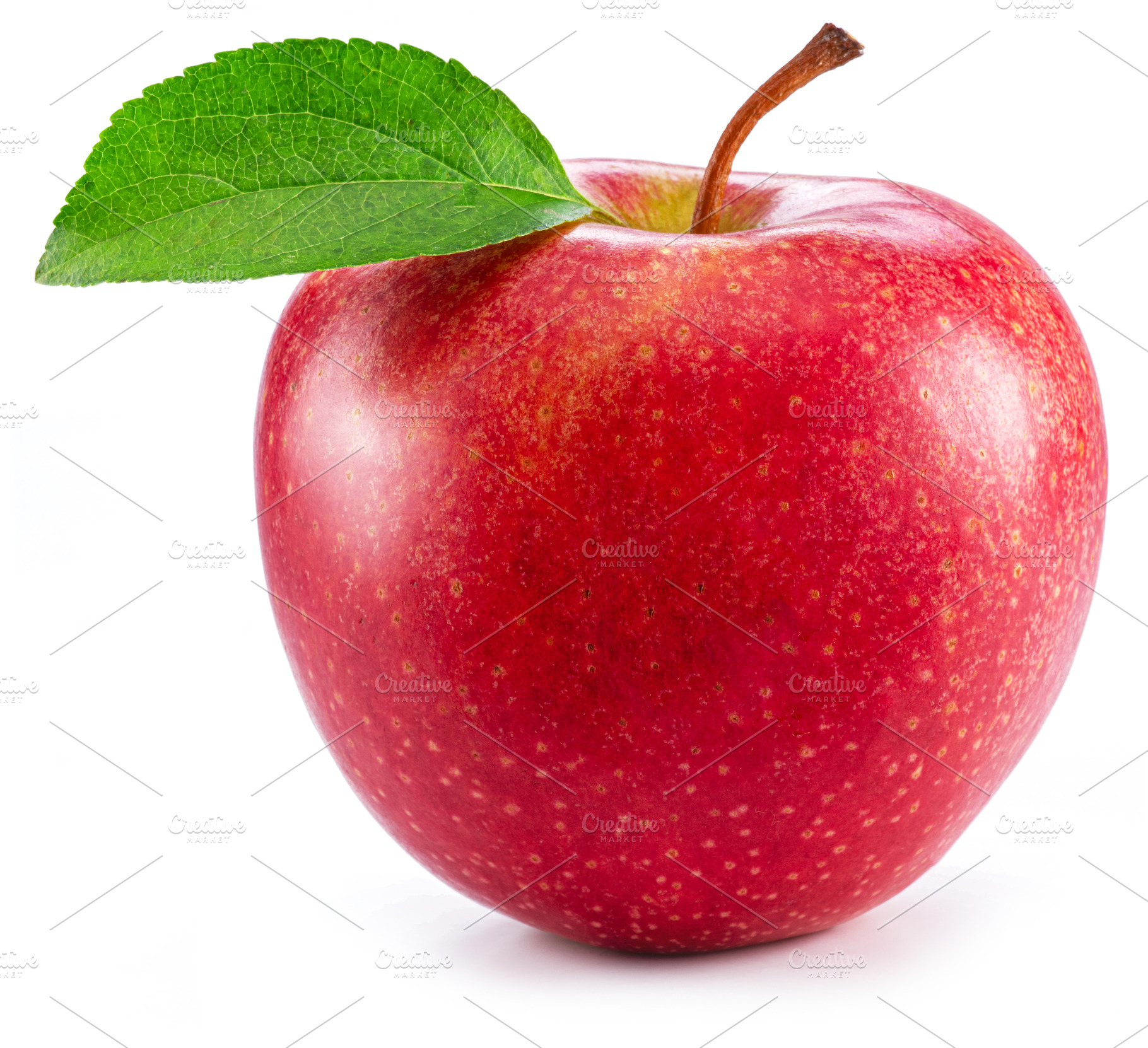 Ripe perfect red apple with green leaf on white background., a Food & Drink Photo by Volff
