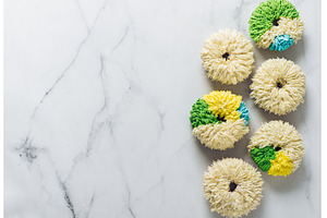 Shag donuts on marble background, a Food & Drink Photo by Fascinadora
