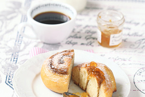 Cinnamon roll stock photo containing background and baked