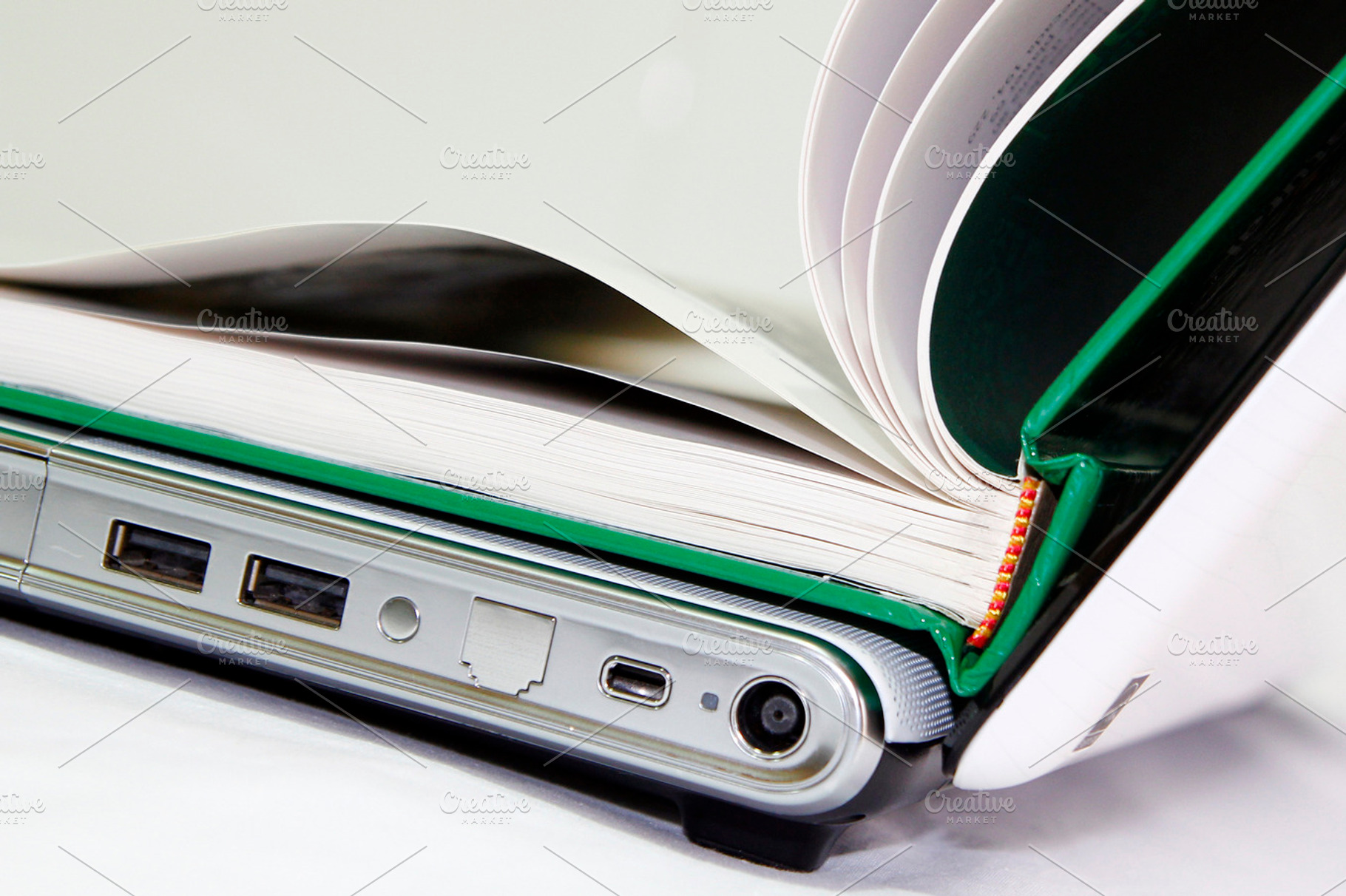 Book and computer, a Technology Photo by aagafapaperiapunta