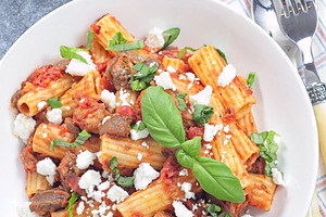 Rigatoni alla Norma pasta with eggplant, tomato, basil and ricotta salata, vert, a Food & Drink Photo by iuliia_n