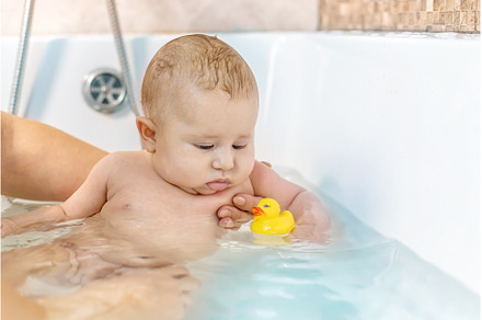Baby after bathing in the bathroom, a Person Photo by yanadjana