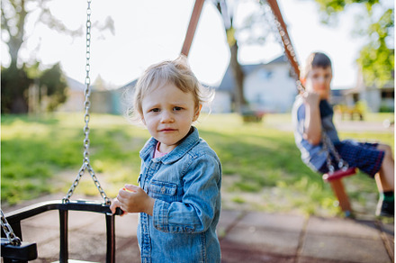 Little sibling playing together in, a Nature Photo by HalfPoint