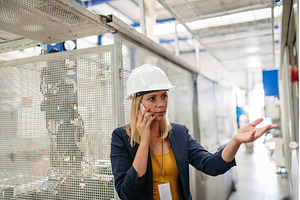 Female engineer or technician making, an Industrial Photo by HalfPoint