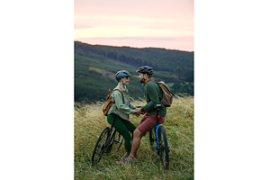 Romantic moment for cyclist couple, a Sports & Recreation Photo by HalfPoint