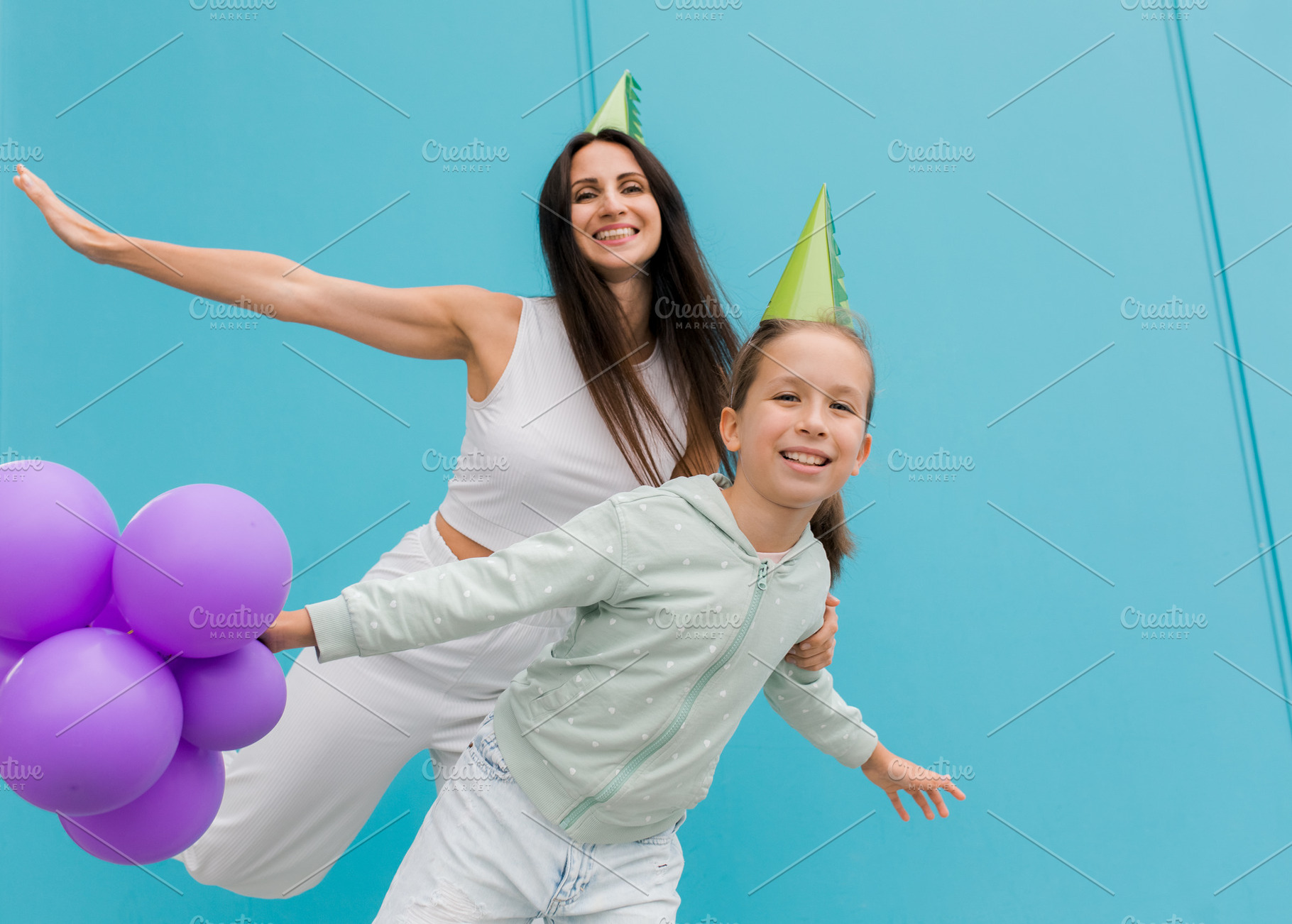 Happy mother and daughter laughing, a Person Photo by Kolomiyets Viktoriya