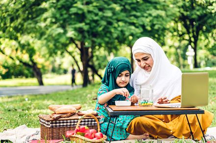 Portrait happy love asian muslim family mother teach little daug