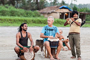Hippies playing music, a Photo by saiko3p