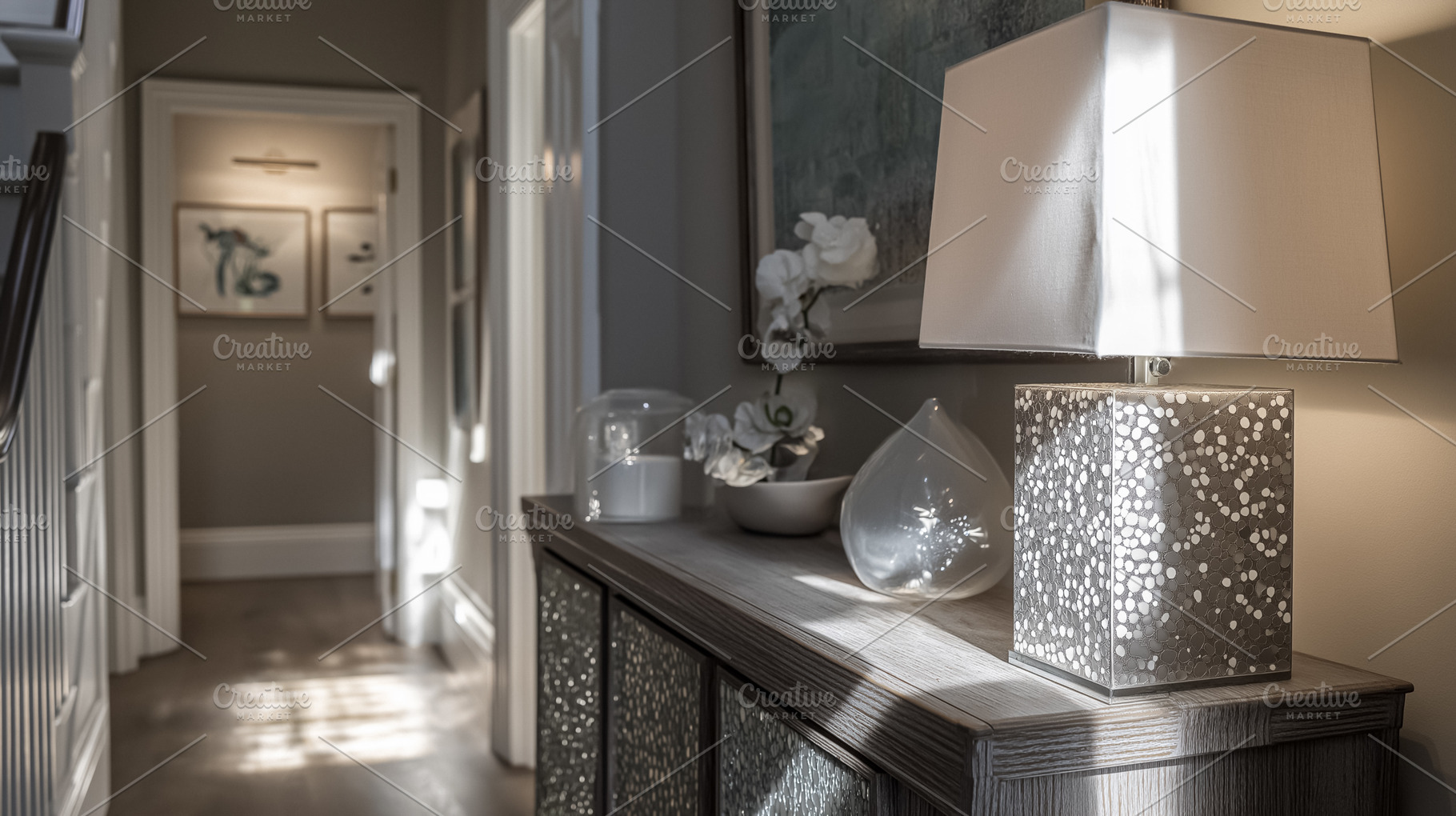 Elegant entrance hall displaying a decorative console table with a modern lamp, an Architecture Photo by Studio ANNA