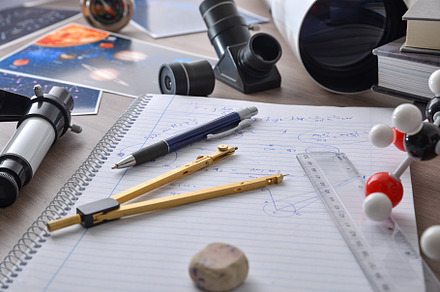 Astronomy student workspace with bench with study material eleva, a School & Education Photo by Davizro's Market