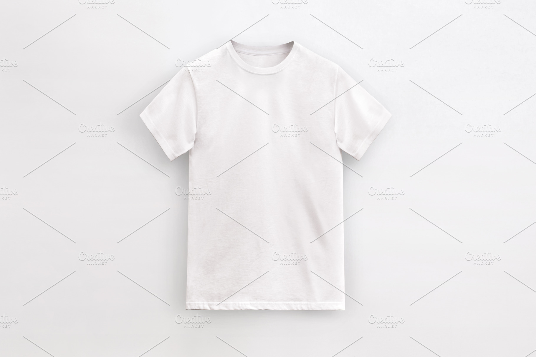 round neck basic white t-shirt, a Photo by UN-BRANDED