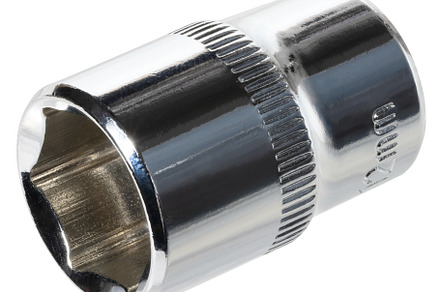 A shiny, chrome plated metal socket wrench head, an essential ha
