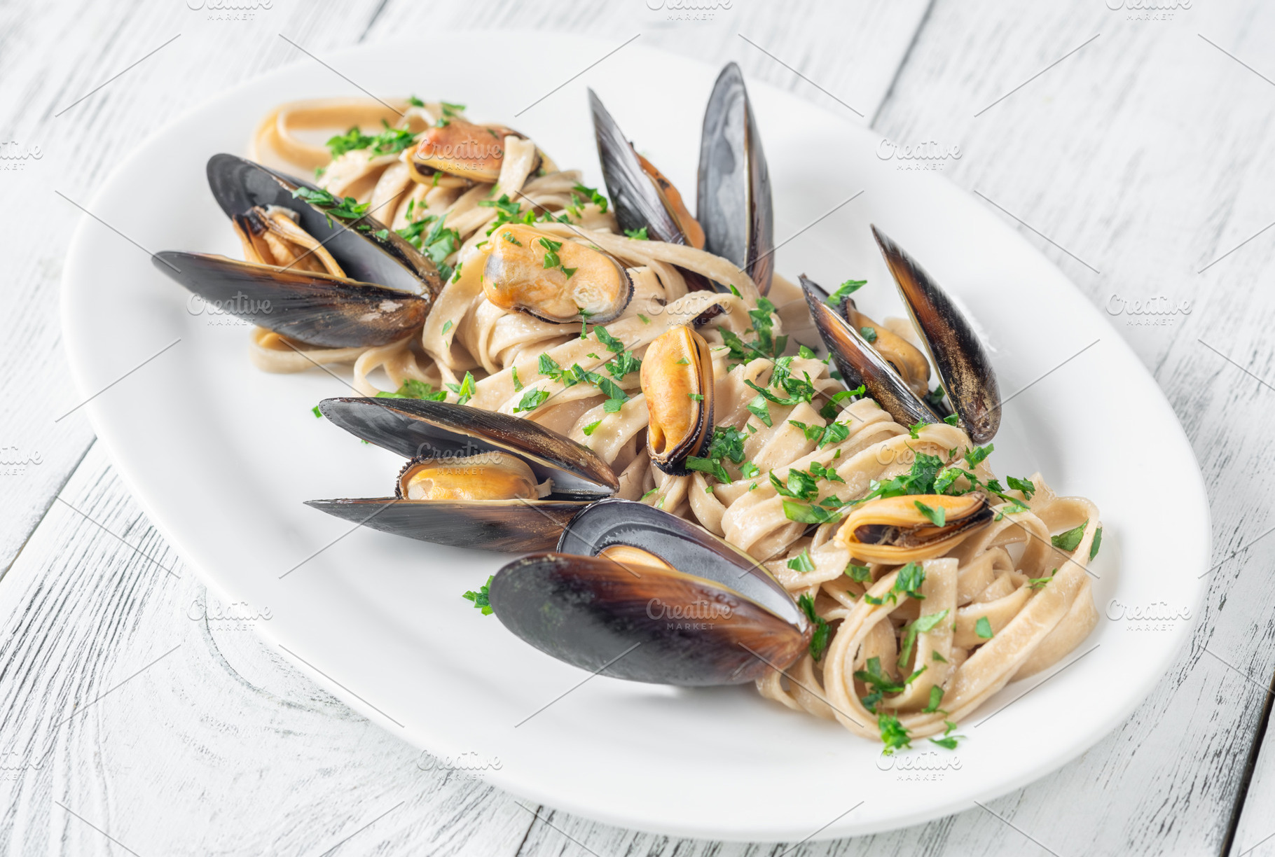 Mussel Fettuccine Delight, a Food & Drink Photo by Alexander Prokopenko