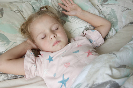 Little girl lying in the bed, a Person Photo by Lisssbetha
