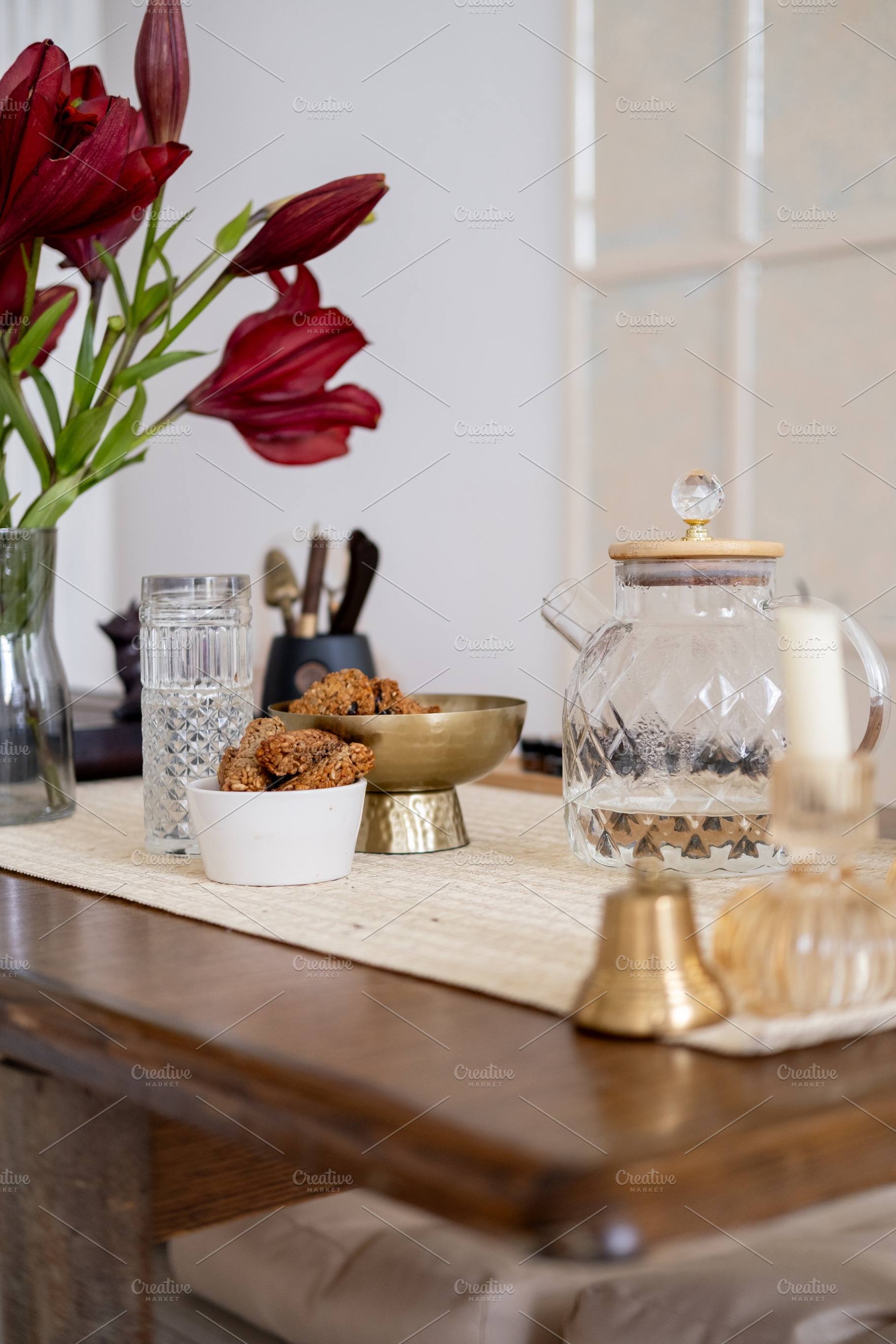 Dining room home atmosphere glass candle flower, a Background Photo by Photo Drive Studio