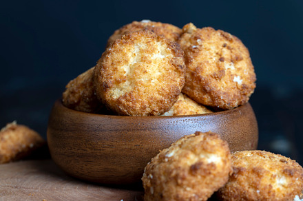 Delicious cookies with coconut on the table, a Food & Drink Photo by MyPhotos
