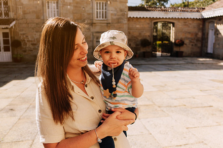 Portrait of a young mother and her nine month old son, a Person Photo by rubenchase