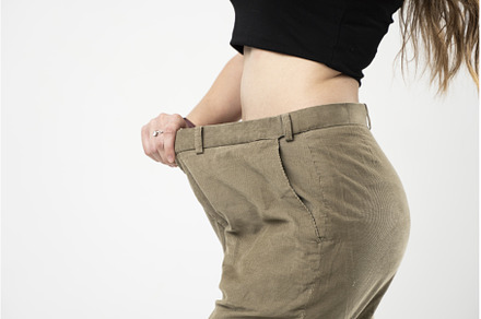Woman showing result after weight, a Sports & Recreation Photo by volodymyrshtun13795