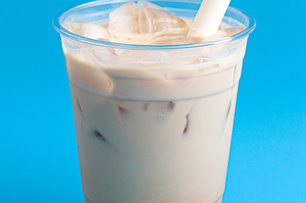 A Caramel Boba Tea on a Blue Background