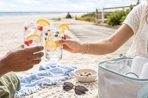 Beach picnic with refreshing summer, a Photo by Dvoevnore photos
