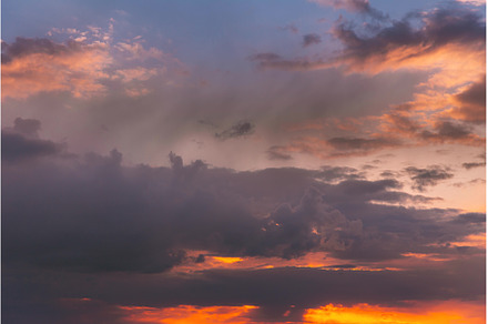 Sunset Cloudy Sky With Fluffy Clouds, a Nature Photo by Our Amazing World