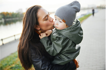 beautiful woman with a baby in her, a Person Photo by Super duper stock images 