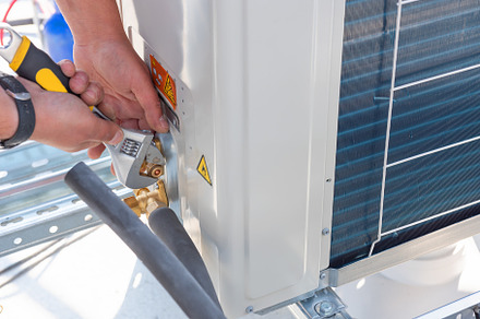 Hvac technician is working featuring air conditioner, service, and technician