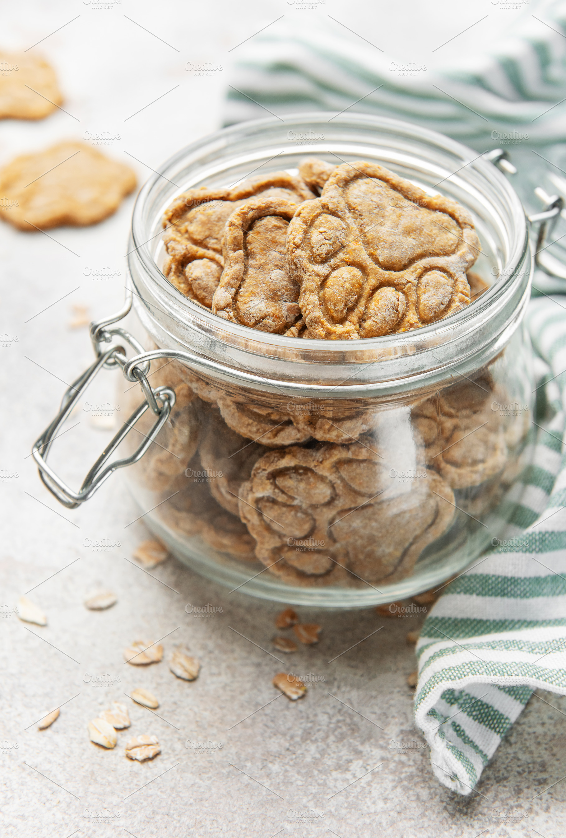 Homemade dog treats paw print cookies in jar, a Food & Drink Photo by Olena Rudo