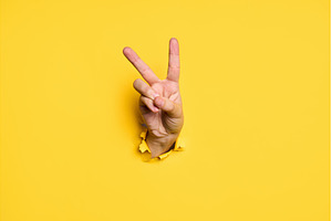 V sign for victory or peace gesture, a Background Photo by Gladkov photography
