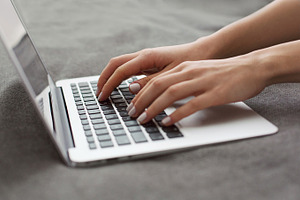 Girl Hands Typing On Laptop