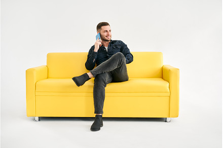 Smiling relaxed man talking on the, a Person Photo by Gladkov photography