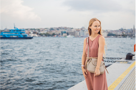 Woman tourist enjoying Galataport, an Architecture Photo by Elizaveta Galitskaya