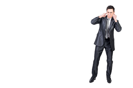 Businessman covering ears from, a Business Photo by Iván Moreno STOCK PHOTO