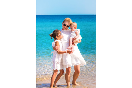 Mother with her daughters at sea, a Person Photo by yanadjana