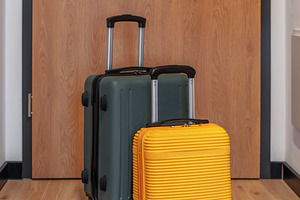 Luggage standing ready for travel vacation or business trip, a Holiday Photo by Olena Rudo