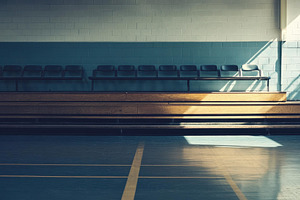 Empty gymnasium with wooden bleacher, a Photo by Tanuart
