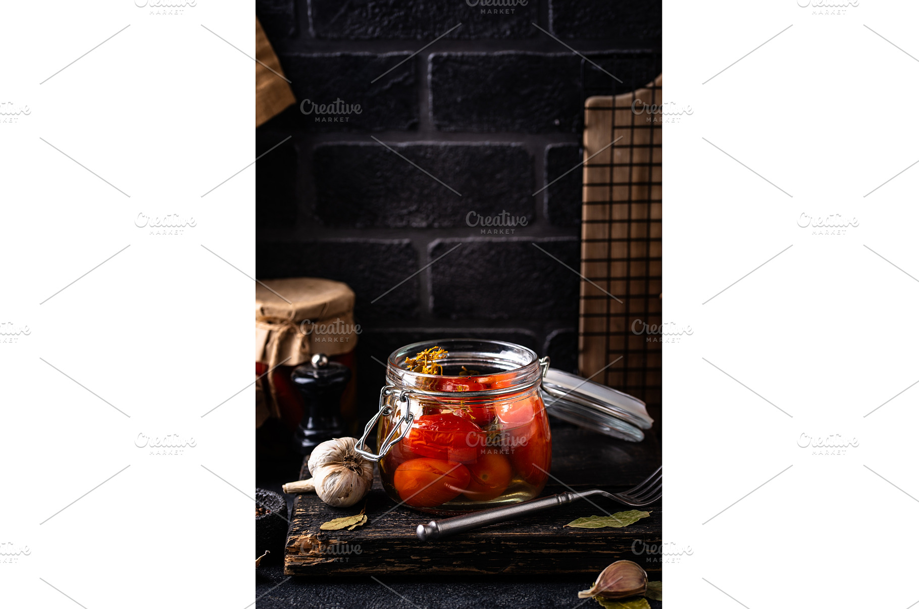 Marinated pickled tomatoes in jar, a Food & Drink Photo by Yulia Furman