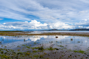 Llachon beach with a scenic view of Lake Titicaca, Peru, a Nature Photo by GoodGoods